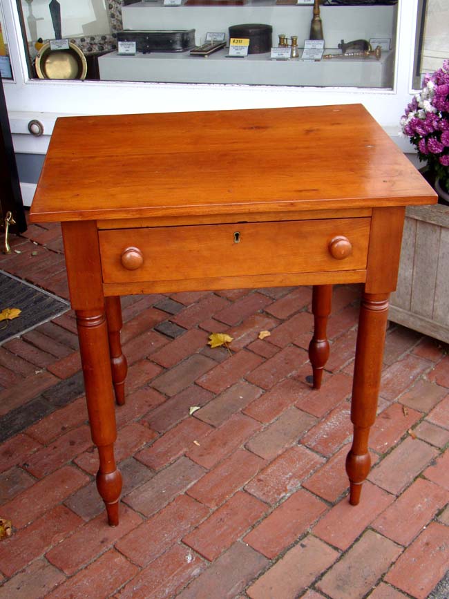 An antique cherry one-drawer nightstand-work table circa 1850